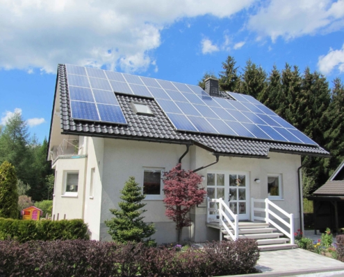 cute small home with solar panels