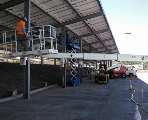 workers installing solar carport