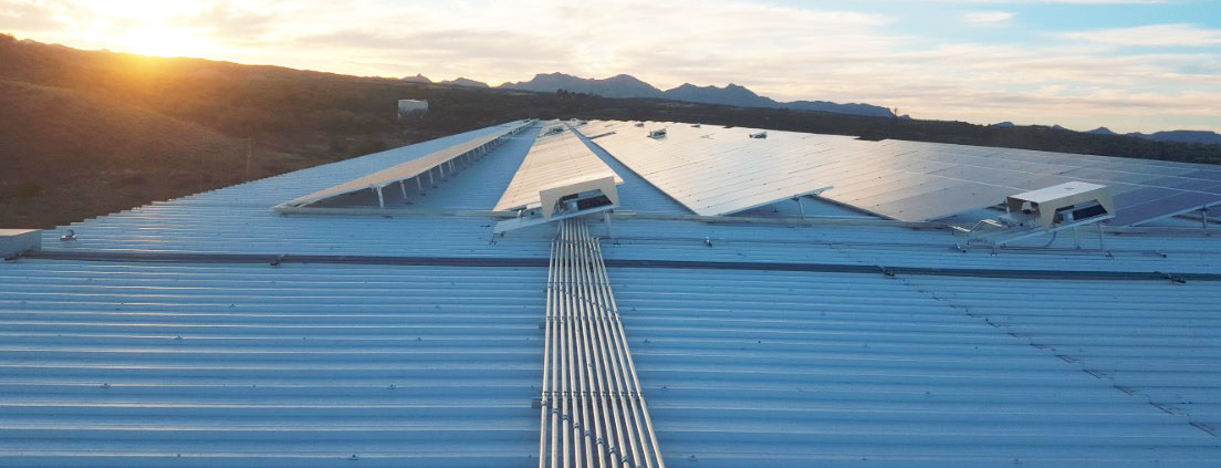 Rooftop solar panels generating energy | Solar Gain